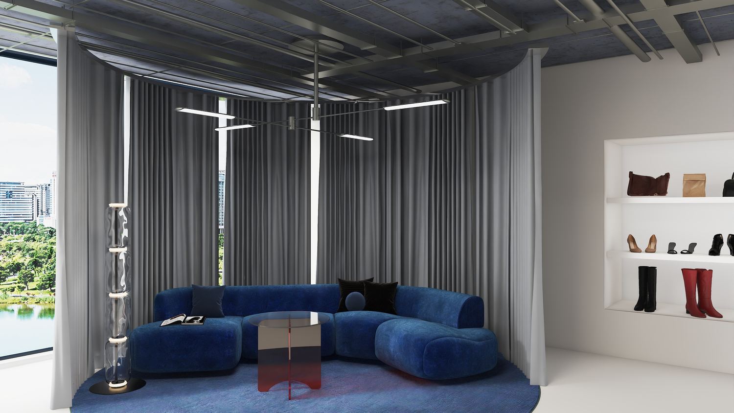 Showroom z kobaltową sofą pod surowym stropem
